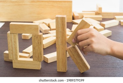 Wooden blocks and boy's hands arranged in letters OK - Shutterstock ID 1989379199