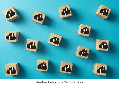 Wooden blocks with cloud computing icons on light blue background concept for cloud technology, online database, information synchronization,digital network,data storage, file sharing, and backup.