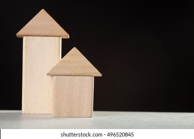 Wooden Blocks House On Black Background