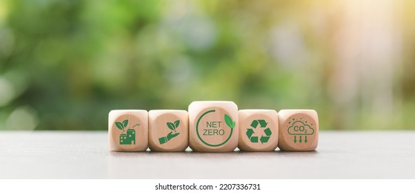 Wooden Blocks And Icons Representing The Concept Of Caring For Nature Together,Net Zero,Carbon Neutral Concepts ,Greenhouse Gas Reduction Policy,Carbon Neutral,Environmental Mind,Green Industry.