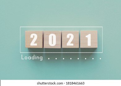 Wooden Blocks In Loading Bar For 2021 Goal Planning Business Concept