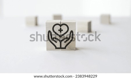 Wooden blocks with medical health icons. Insurance for your health concept. Public health program.