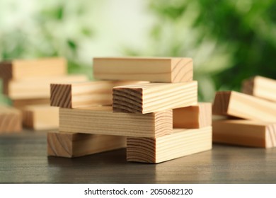 Wooden Blocks On Table Outdoors. Jenga Game