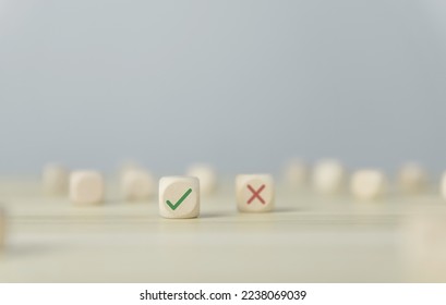 Wooden blocks show checks marks and are wrong. concepts decisions, votes, and thinking yes or no. Business options for difficult situations true and false symbols - Shutterstock ID 2238069039