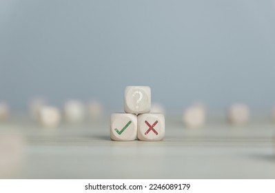 Wooden blocks show checks marks and are wrong. concepts decisions, votes, and thinking yes or no. Business options for difficult situations true and false symbols - Shutterstock ID 2246089179