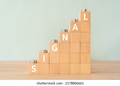 Wooden blocks with "SIGNAL" text of concept and coins. - Powered by Shutterstock - Get 15% off with code: PIKWIZARD15