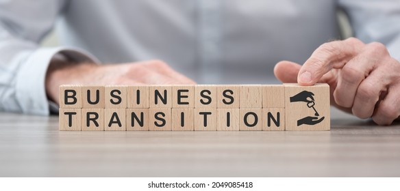 Wooden Blocks With Symbol Of Business Transition Concept