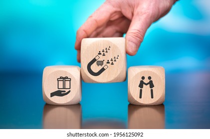 Wooden Blocks With Symbol Of Customer Loyalty Concept On Blue Background