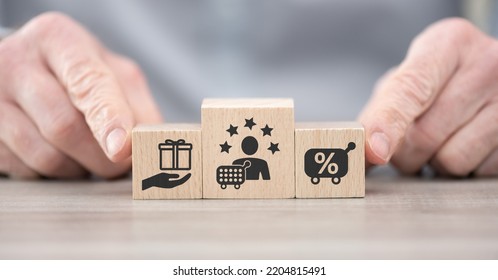 Wooden blocks with symbol of customer loyalty concept - Shutterstock ID 2204815491
