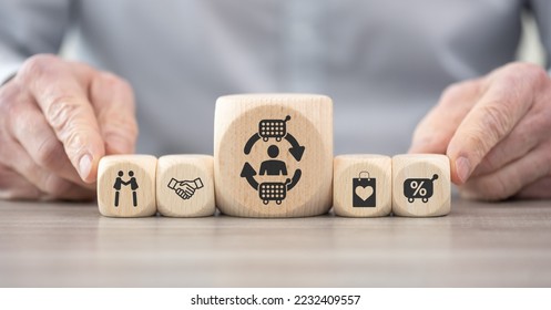 Wooden blocks with symbol of customer loyalty concept - Shutterstock ID 2232409557