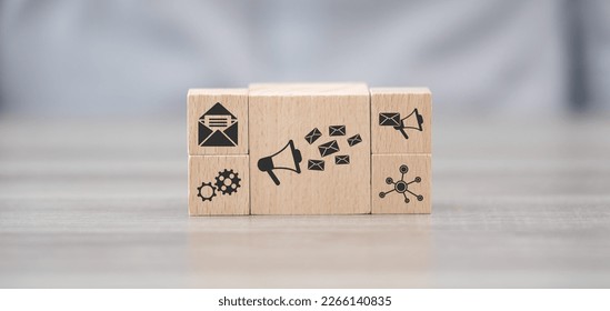 Wooden blocks with symbol of email marketing concept - Shutterstock ID 2266140835