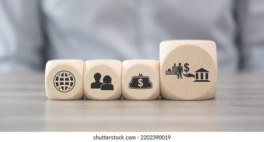 Wooden Blocks With Symbol Of Government Aid Concept