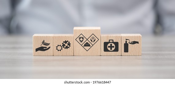 Wooden blocks with symbol of hse concept - Shutterstock ID 1976618447