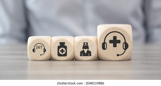 Wooden Blocks With Symbol Of Medical Hotline Concept