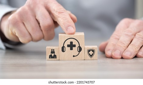 Wooden Blocks With Symbol Of Medical Hotline Concept