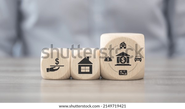 Wooden blocks\
with symbol of personal loan\
concept