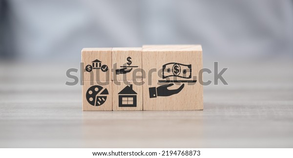 Wooden blocks\
with symbol of personal loan\
concept