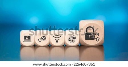 Wooden blocks with symbol of vpn concept on blue background