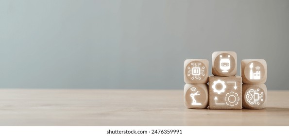 Wooden blocks with technology icons symbolizing digital twin concept, AI, IoT, and smart industry solutions on a neutral background. - Powered by Shutterstock