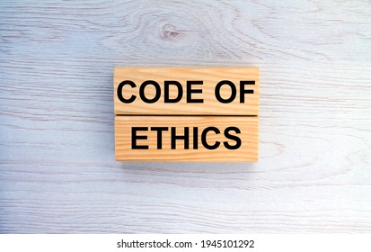 Wooden Blocks With Text Code Of Ethics On The Wooden Background. Concept Photo