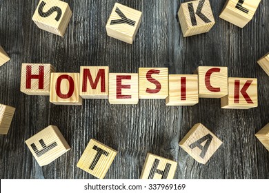 Wooden Blocks With The Text: Homesick