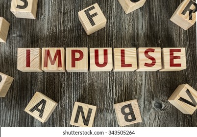 Wooden Blocks With The Text: Impulse