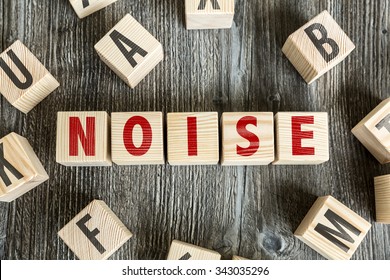 Wooden Blocks with the text: Noise