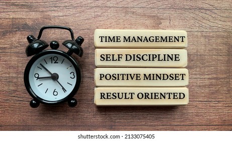 Wooden Blocks With Text - Time Management, Self Discipline, Positive Mindset, Result Oriented. Business Concept