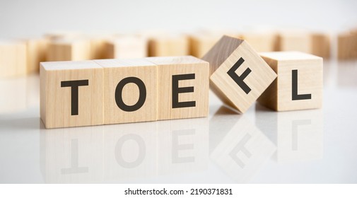 Wooden Blocks With The Text: TOEFL - Test Of English As A Foreign Language