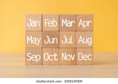 Wooden blocks with twelve months text. - Shutterstock ID 2058149309