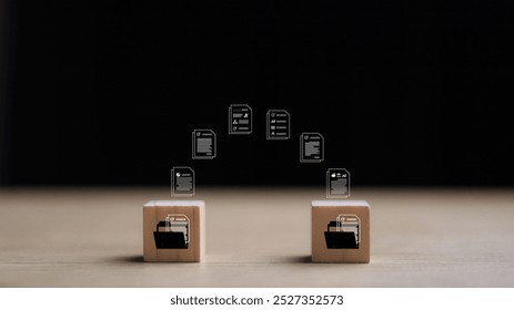 Wooden blocks with virtual document loading to another folder. Data copy or move. Transfer files of data between folders. Exchange of file on folder. Send document to the internet.