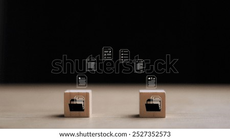 Wooden blocks with virtual document loading to another folder. Data copy or move. Transfer files of data between folders. Exchange of file on folder. Send document to the internet.