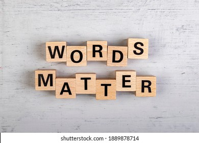 wooden blocks  in a white and grey board with the text words matter