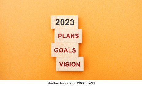 Wooden Blocks With The Word 2023, Plans, Goals, Vision. Setting Goal, Target For Next Year. Plans And Tasks. Financial Management In Company. Business And Finance Concept