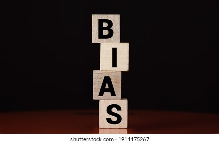 Wooden Blocks With The Word Bias. Prejudice. Personal Opinions. Preconception.