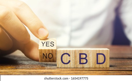 Wooden blocks with the word CBD. Marijuana, cannabis, hemp. Concept of cannabidiol