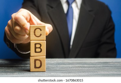Wooden blocks with the word CBD. Marijuana, cannabis, hemp. Concept of cannabidiol