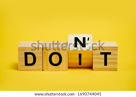 Wooden blocks with word Don't Change To Do It