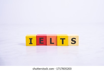 Wooden Blocks With The Word IELTS - International Standardised Test Of English Language.