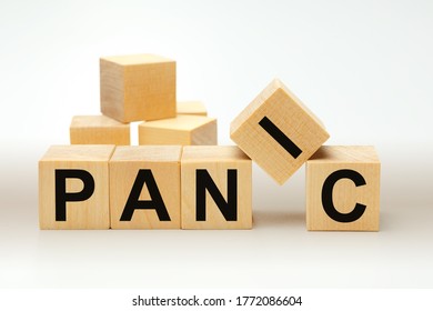 Wooden blocks with the word PANIC. Business concept