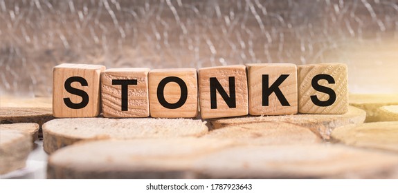 Wooden Blocks With The Word Stonks. Business And Finance Concept.