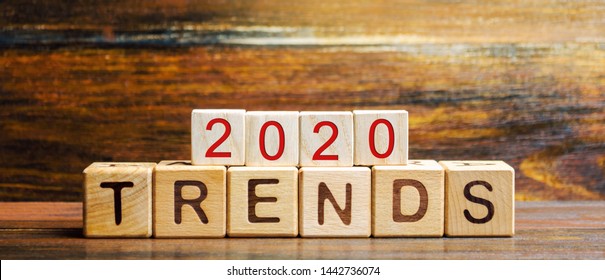 Wooden blocks with the word Trends 2020. Main trend of changing something. Popular and relevant topics. New ideological trends of fashion. Recent and latest trend. Evaluation methods. Fashionable - Shutterstock ID 1442736074