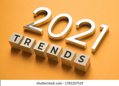 Wooden Blocks With The Word Trends And Metal Numbers 2021. Popular , Relevant Topics. New Trends Of Fashion.