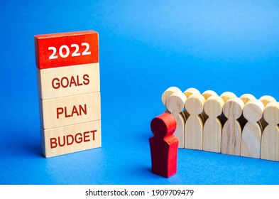 Wooden Blocks With The Words 2022, Goals, Plan, Budget And Team Of Workers. Planning, Plans And Tasks. New Business Ideas. Setting Goal, Target. Motivation, Inspiration. Financial Management