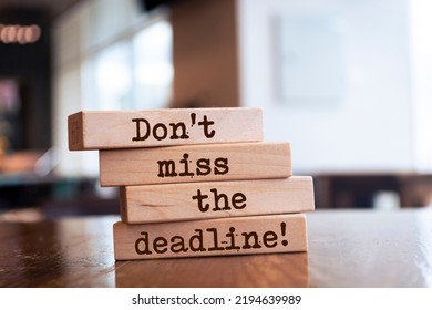 Wooden blocks with words 'Don't miss the deadline'. - Shutterstock ID 2194639989