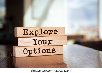 Wooden blocks with words 'Explore Your Options'.