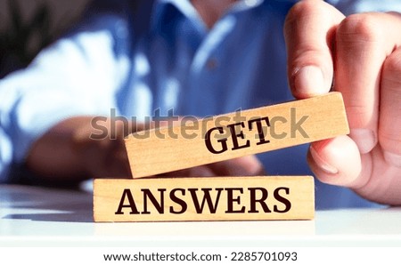 Wooden blocks with words 'Get answers'. Business concept
