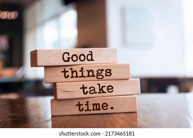 Wooden blocks with words 'Good things take time'.