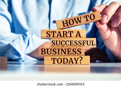 Wooden Blocks With Words 'How To Start A Successful Business Today?'.