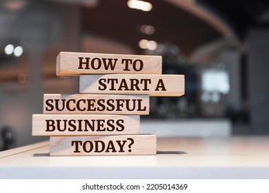 Wooden Blocks With Words 'How To Start A Successful Business Today?'.